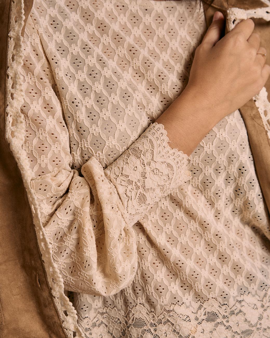 Blusa con dettagli Camelia
